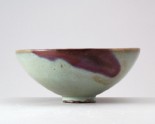 Bowl with blue glaze and purple splashes