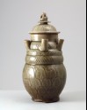 Greenware funerary jar with five spouts