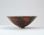 Black ware bowl with russet iron splashes