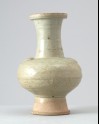 White ware vase with animal masks and floral decoration