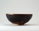Black ware bowl with stripes