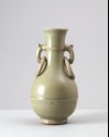 Greenware vase with handles in the form of dragons