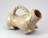 Greenware huzi, or male chamber pot, in the form of a tiger