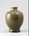Greenware vase with floral decoration