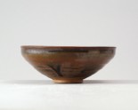 Black ware bowl with russet iron splashes