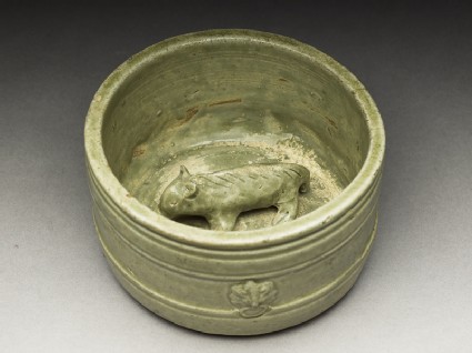 Greenware burial figure of pig in a penoblique