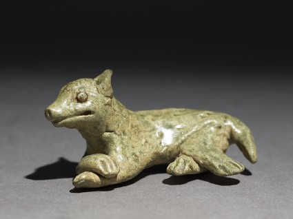 Greenware burial figure of a dogoblique