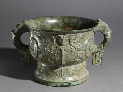 Ritual food vessel, or gui, with coiled figures and taotie masksoblique