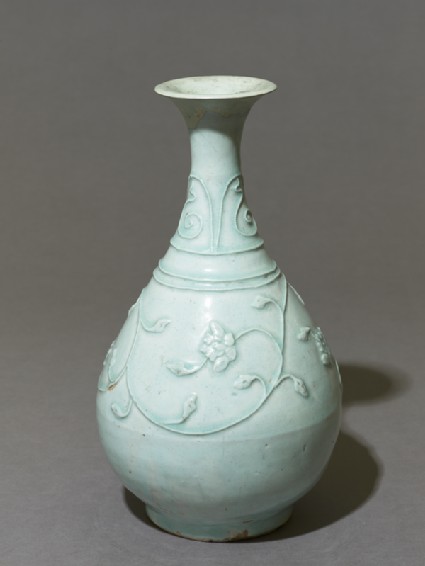 White ware vase with floral decorationoblique