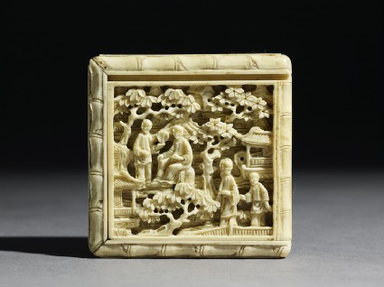 Ivory puzzle box with figures in a gardentop