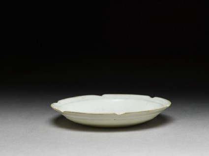 White ware dish with flattened and lobed rimoblique