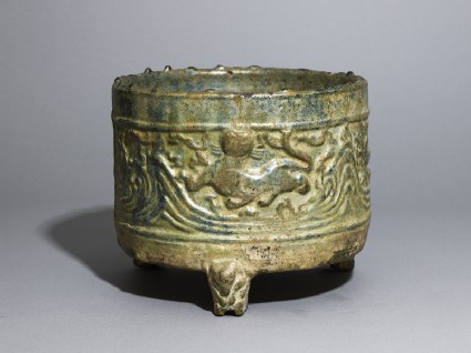 Three-legged basin, or lian, with tigers and mountains in reliefoblique