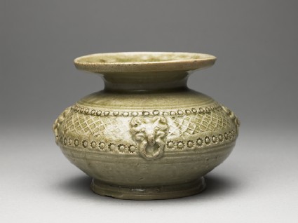 Greenware guan, or jar, with dish-shaped mouth and bands of decorationoblique