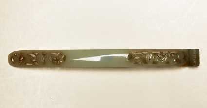Hair crosspiece with openwork design of lotus flowers and a battop