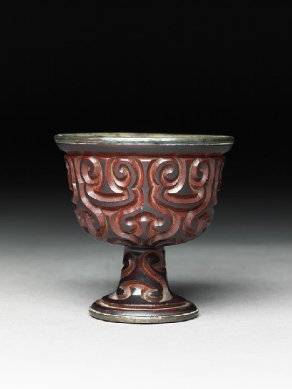 Lacquered stem cup with silver liningside