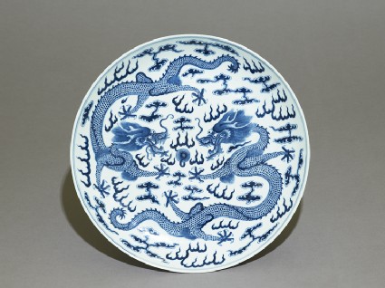 Blue-and-white dish with dragons chasing a flaming pearltop