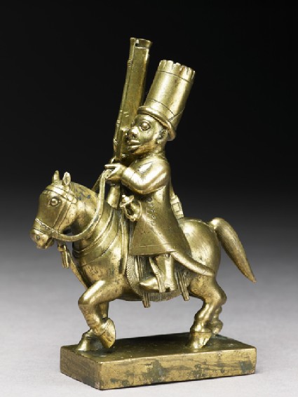 Toy soldier with horse and musketside