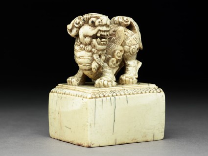 Ivory seal surmounted by a shishi, or lion dogside