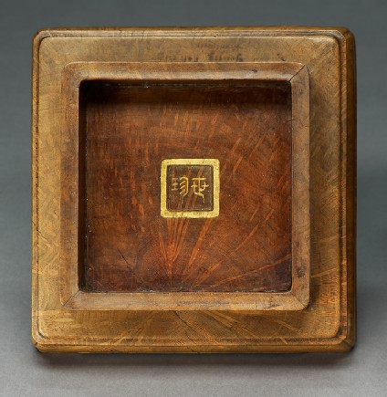 Base of a seal box with geometric decorationtop