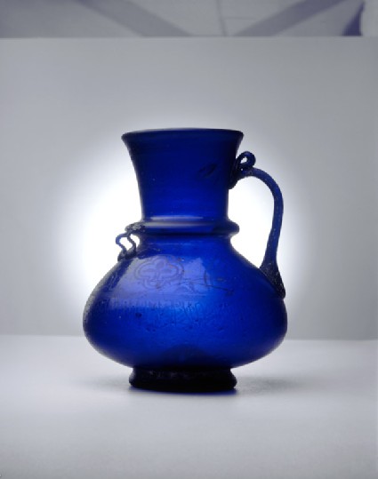 Blue glass jug with naskhi inscriptionside