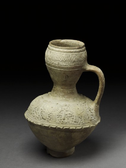 Ewer with paired birdsoblique
