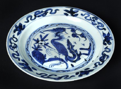 Blue-and-white plate with a cranefront