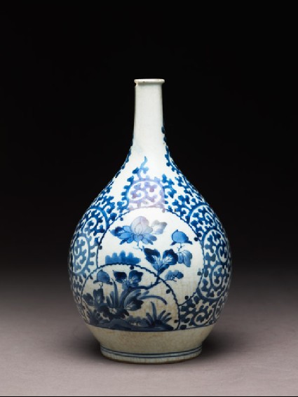 Bottle with cartouches depicting peonies on rocksside