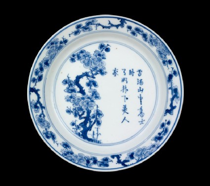 Blue-and-white dish with prunus tree and poemtop