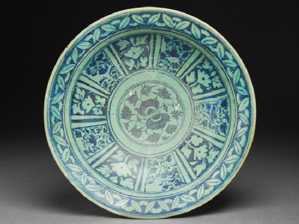 Dish with floral decoration in radial panelstop