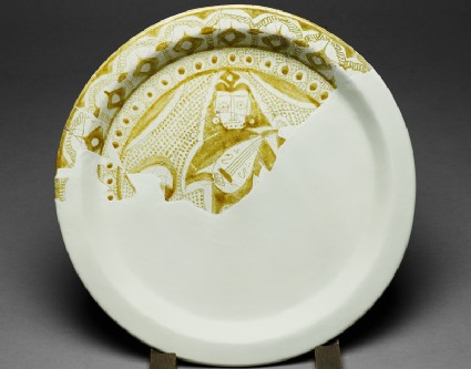 Fragmentary dish with figure of a musicianfront
