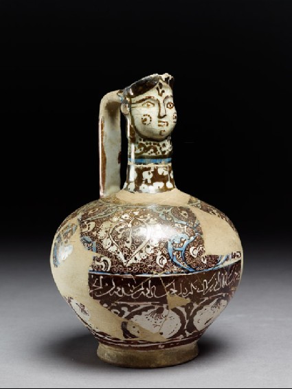 Ewer with human-headed spoutside