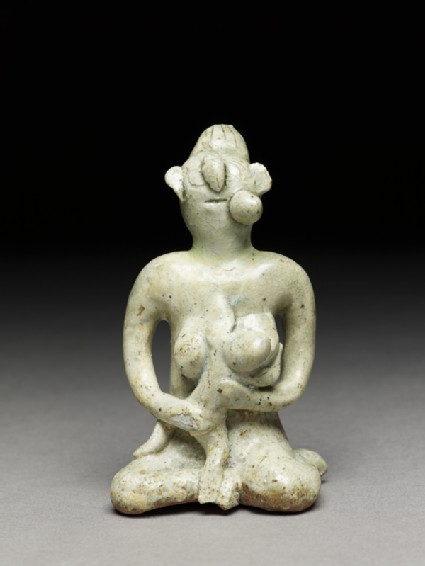 Greenware figure of mother and childfront