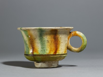 Cup with striped three-coloured glazeside
