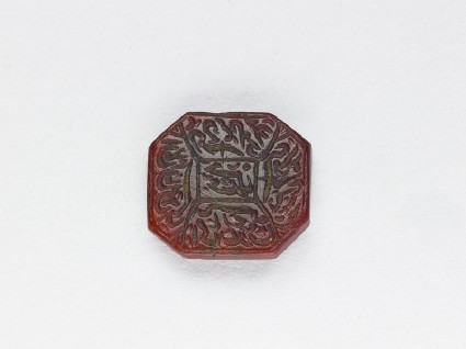 Octagonal bezel seal with nasta’liq inscription and linear decorationfront