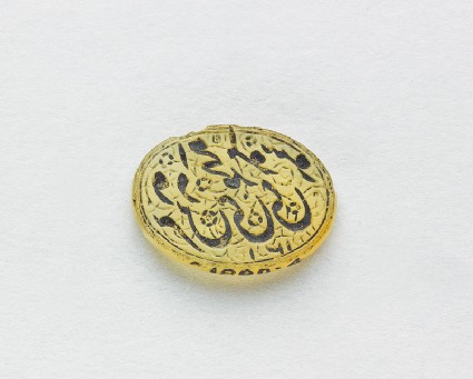 Oval bezel seal with nasta‘liq inscription and floral decorationfront