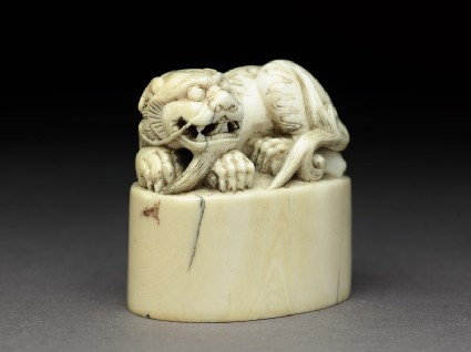 Private ivory seal surmounted by a shishi, or lion dogoblique