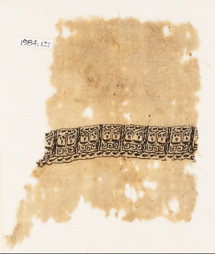 Textile fragment with vine and leavesfront