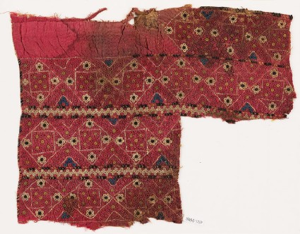 Textile fragment with quilted bandsfront