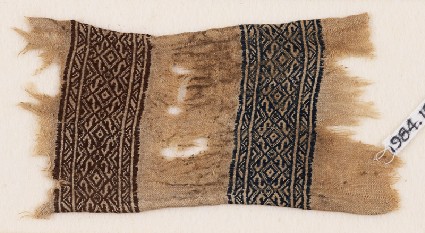 Textile fragment with bands of triangles, S-shapes, and diamond-shapesfront