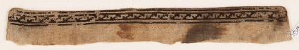 Textile fragment from a garment with stepped S-shapesfront