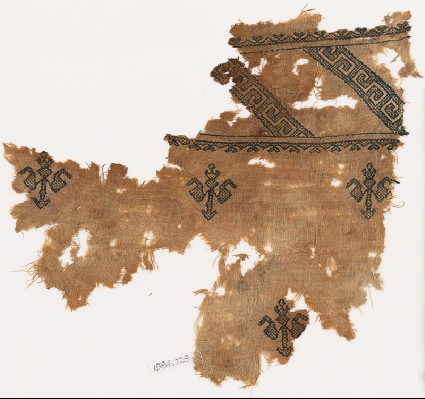 Textile fragment with triangles, V-shapes, and S-shapesfront
