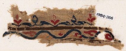 Textile fragment with vine and leavesfront