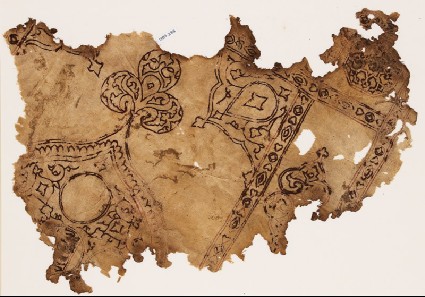 Textile fragment with remains of a large medallion with a trefoil finialfront