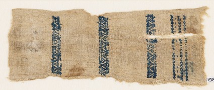 Textile fragment with zigzags and linked squaresfront