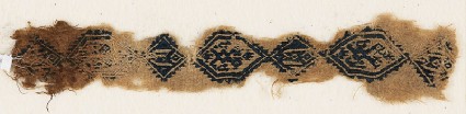 Textile fragment with two-headed birds and inscriptionfront