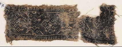 Textile fragment with bands of ornate diamond-shapes and hooksfront