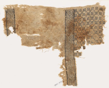 Textile fragment with flowers, crosses, and interlacing diamond-shapesfront