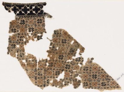 Textile fragment with eight-pointed stars or flowersfront