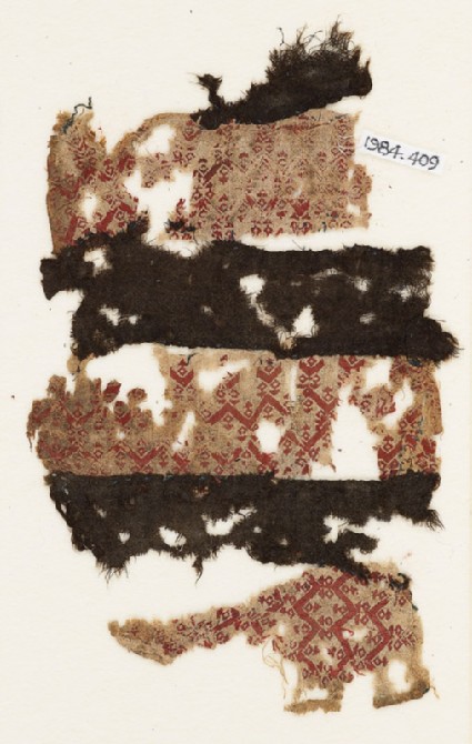 Textile fragment with three bands of chevronsfront