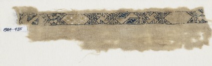 Textile fragment with band of cartouches, spirals, and starsfront